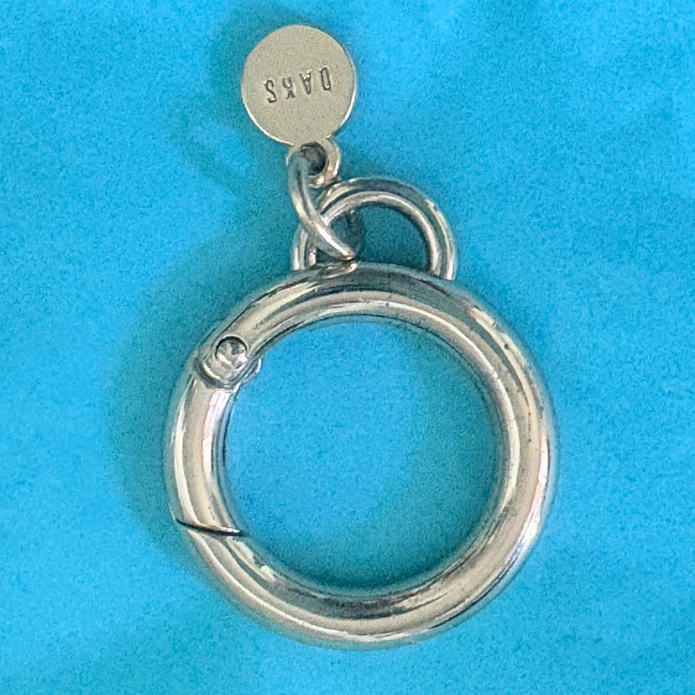 Daks vintage rare gold toned key ring.